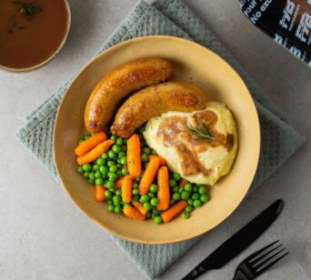 Kartoffelpüree - Hühnerwurst - Erbsen und Möhren (mit Soße)