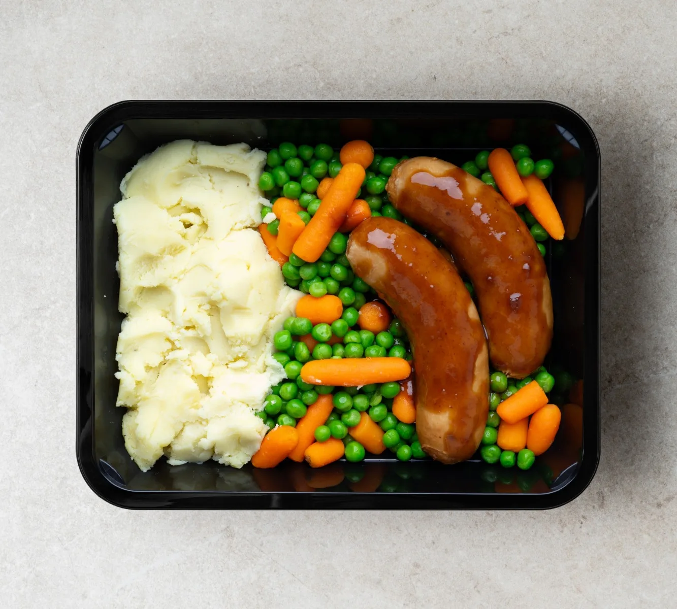 Kartoffelpüree - Hühnerwurst - Erbsen und Möhren (mit Soße) [BULK]